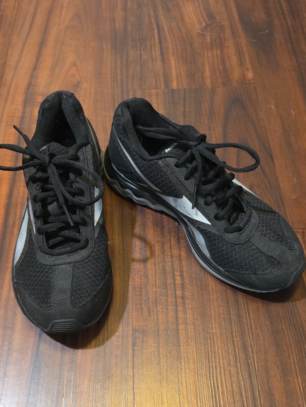 Reebok Women’s Black Athletic Mesh Running Sneakers with Silver Accent